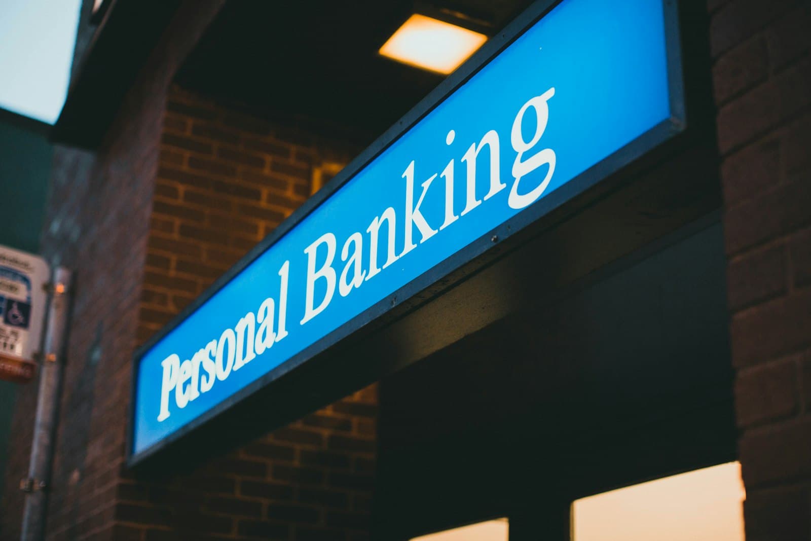 A retail bank branch sign, illustrating off-channel business communications.
